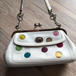 Small white polka dot purse